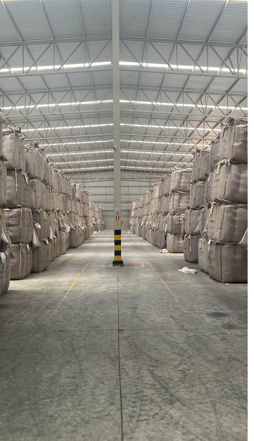 Brazilian coffee cooperative warehouse — sacks in store